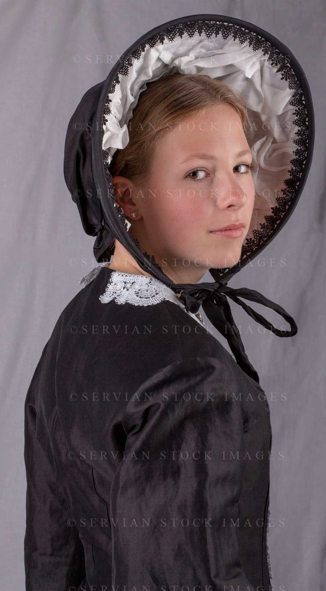 Victorian woman wearing a black bodice and skirt (Skye 0150)