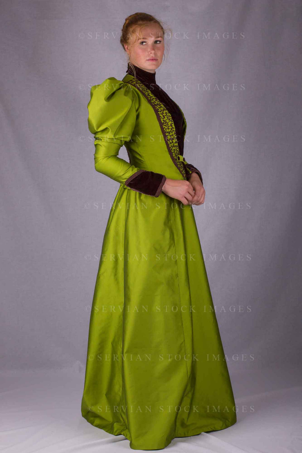 Victorian woman in a green silk ensemble (Lauren 0155)