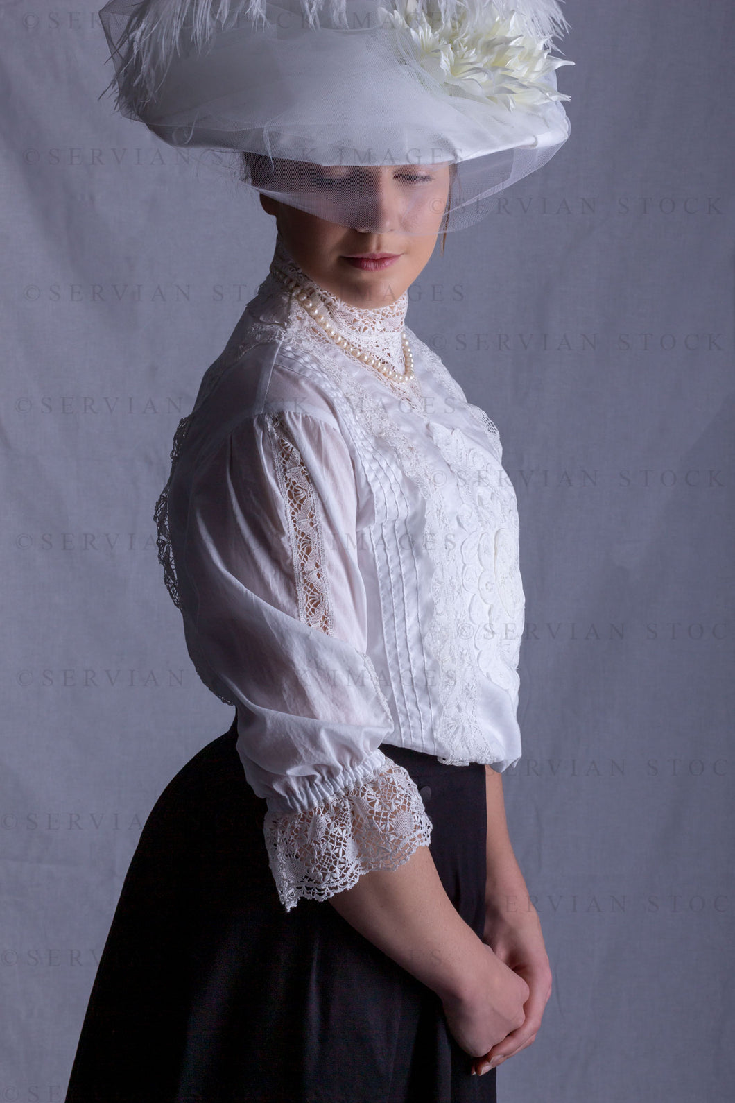 Edwardian woman in a white lace blouse and black skirt (Tayla 0159)