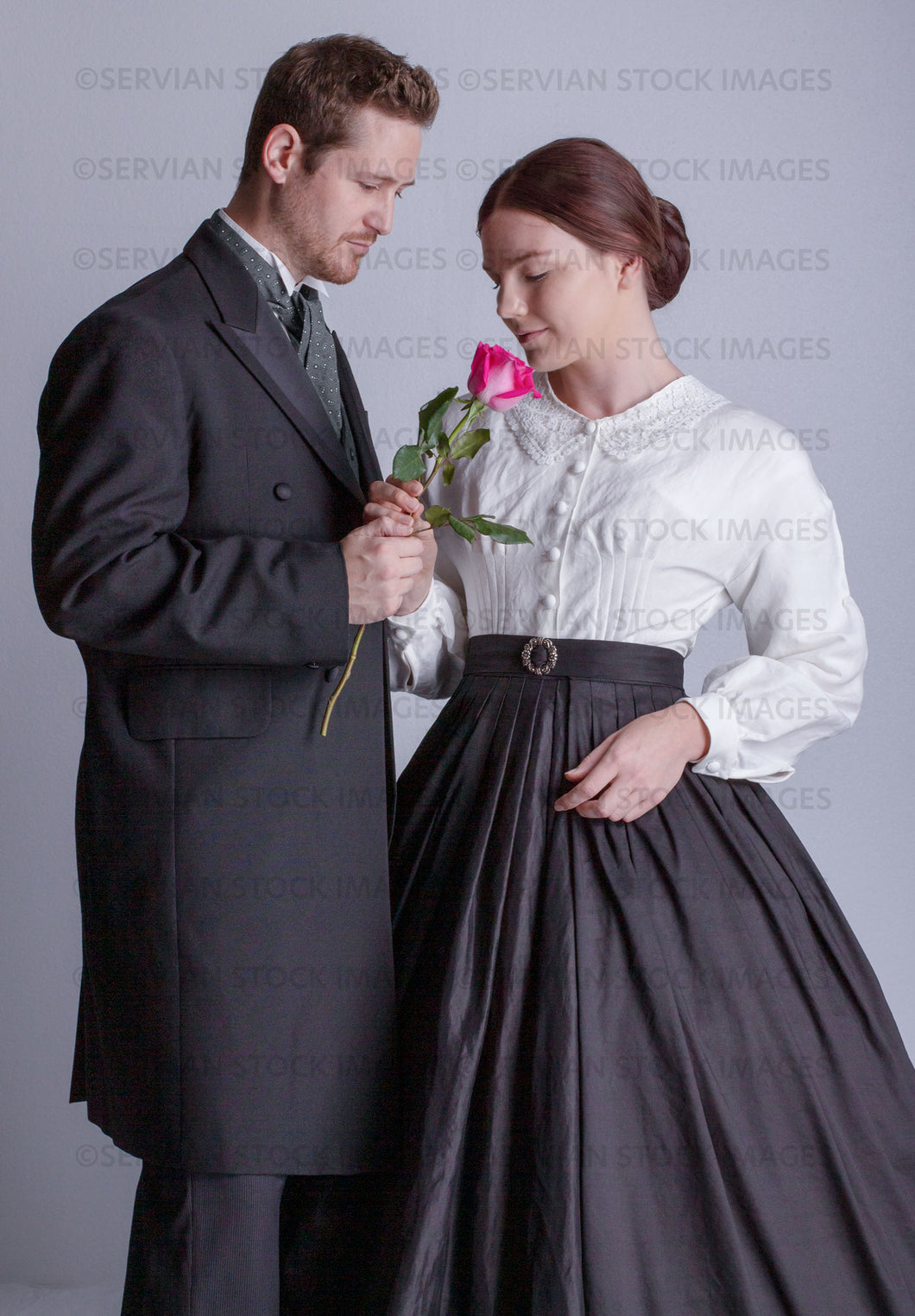Victorian couple against a light grey backdrop (Tayla and Aaron 0173)