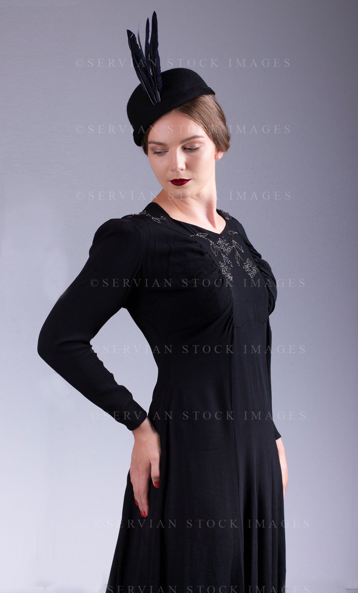 1930s black dress woman in a vintage black, beaded (Tayla 0014) – Servian Stock Images Black Gothic Wedding Dresses gore flutter skirt INFL Prom Style:Black JSK + Bolero Set