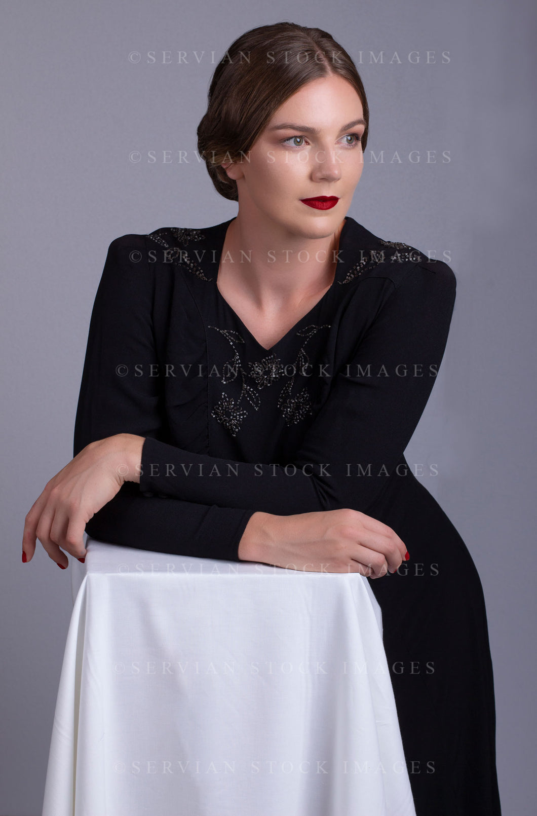 1930s woman in a vintage black, beaded dress (Tayla 0119)