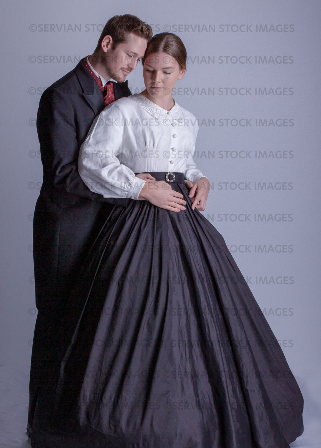 Victorian couple against a light grey backdrop (Tayla and Aaron 0199)