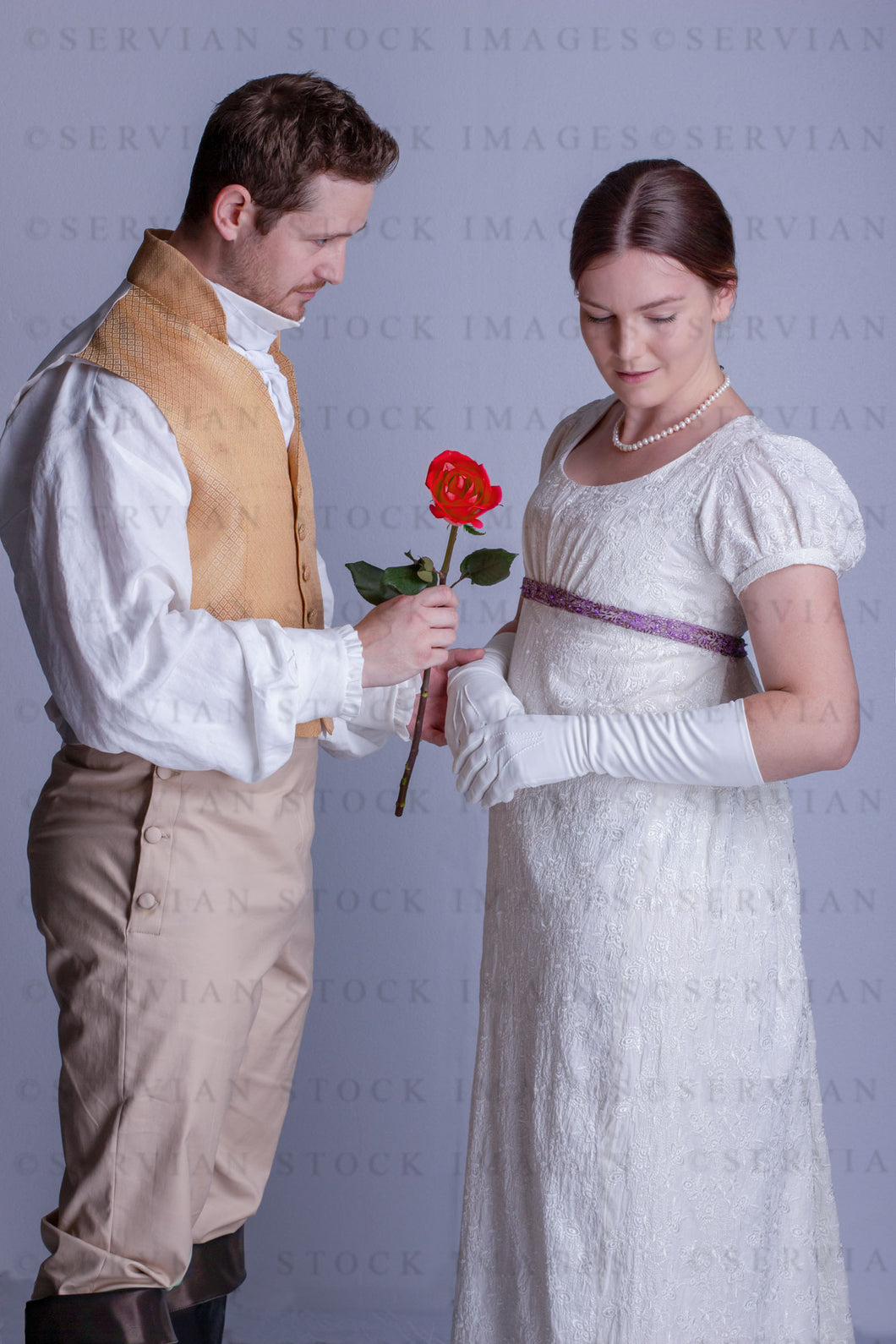 Regency couple against a light grey backdrop (Tayla and Aaron 0266)