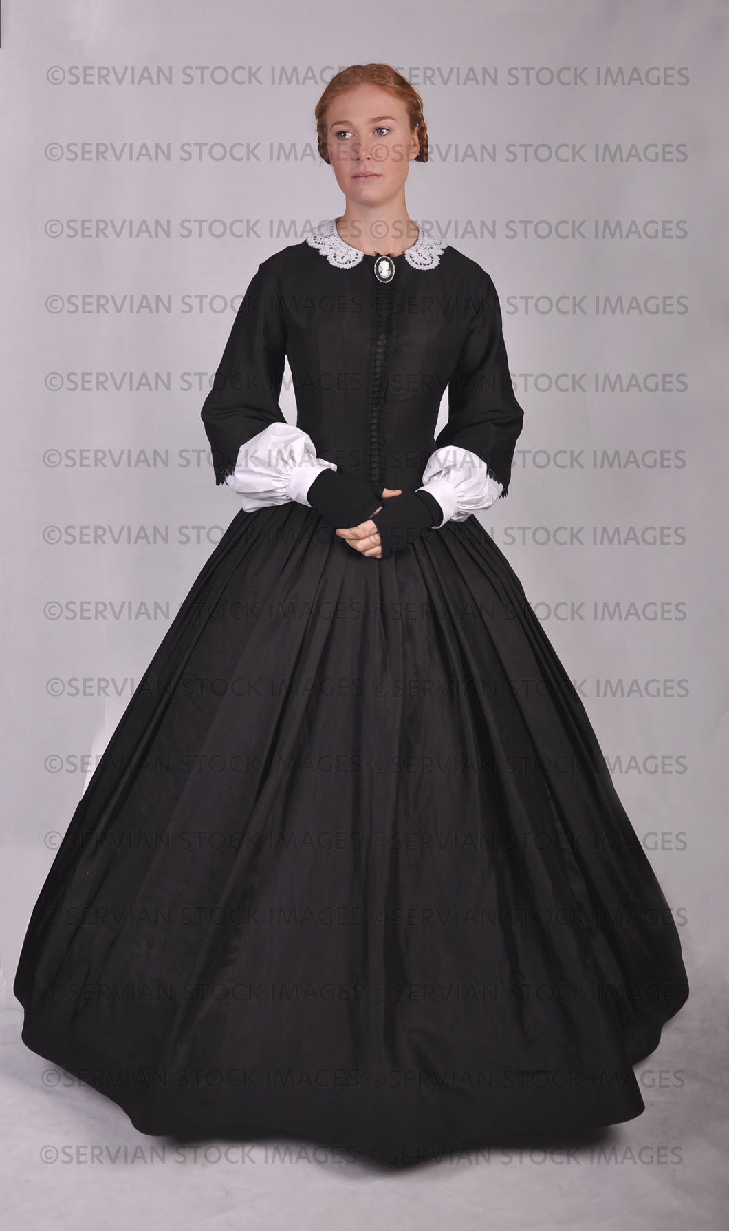 Victorian woman in a black ensemble with a lace collar  (Lauren 0731)