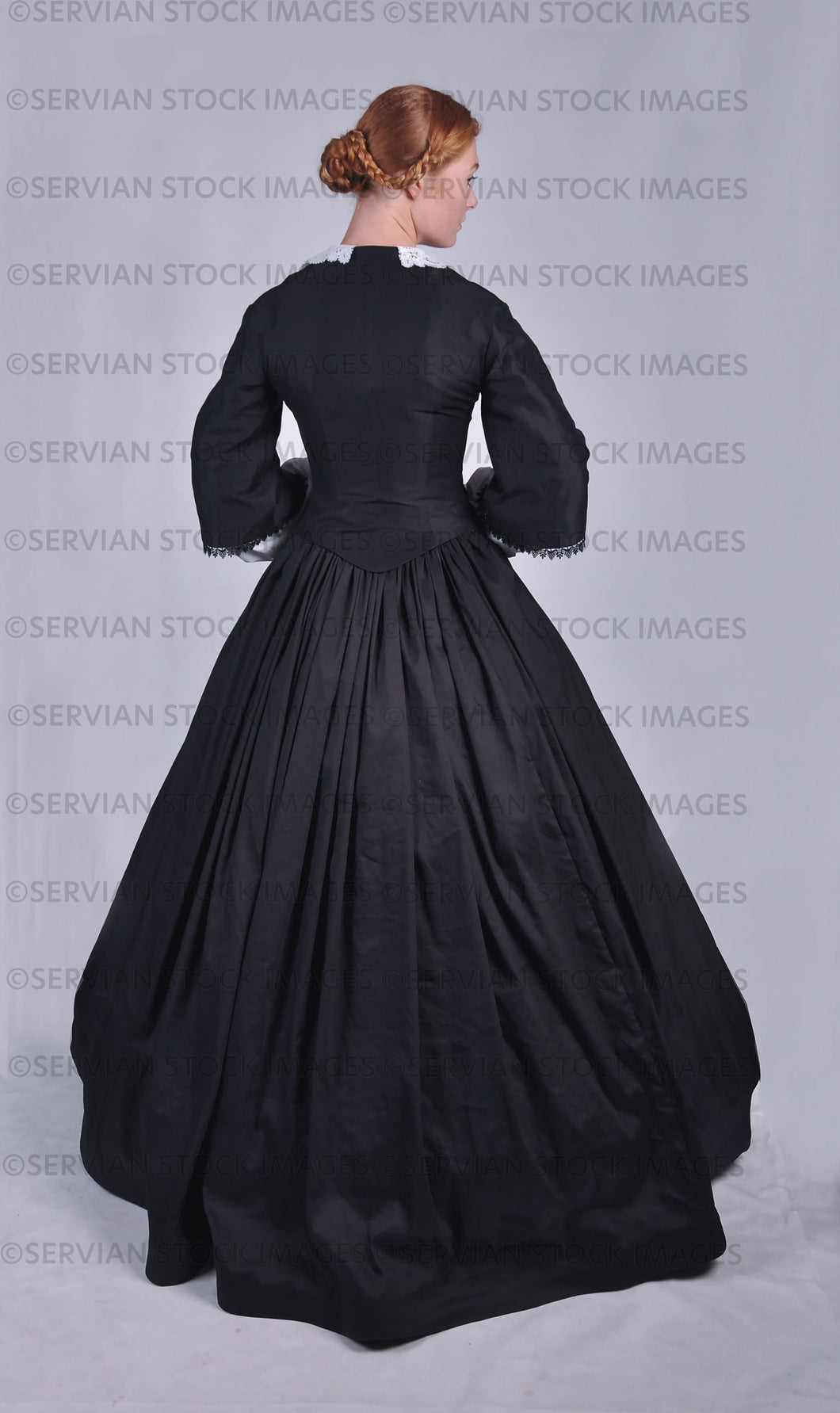 Victorian woman in a black ensemble with a lace collar  (Lauren 0778)