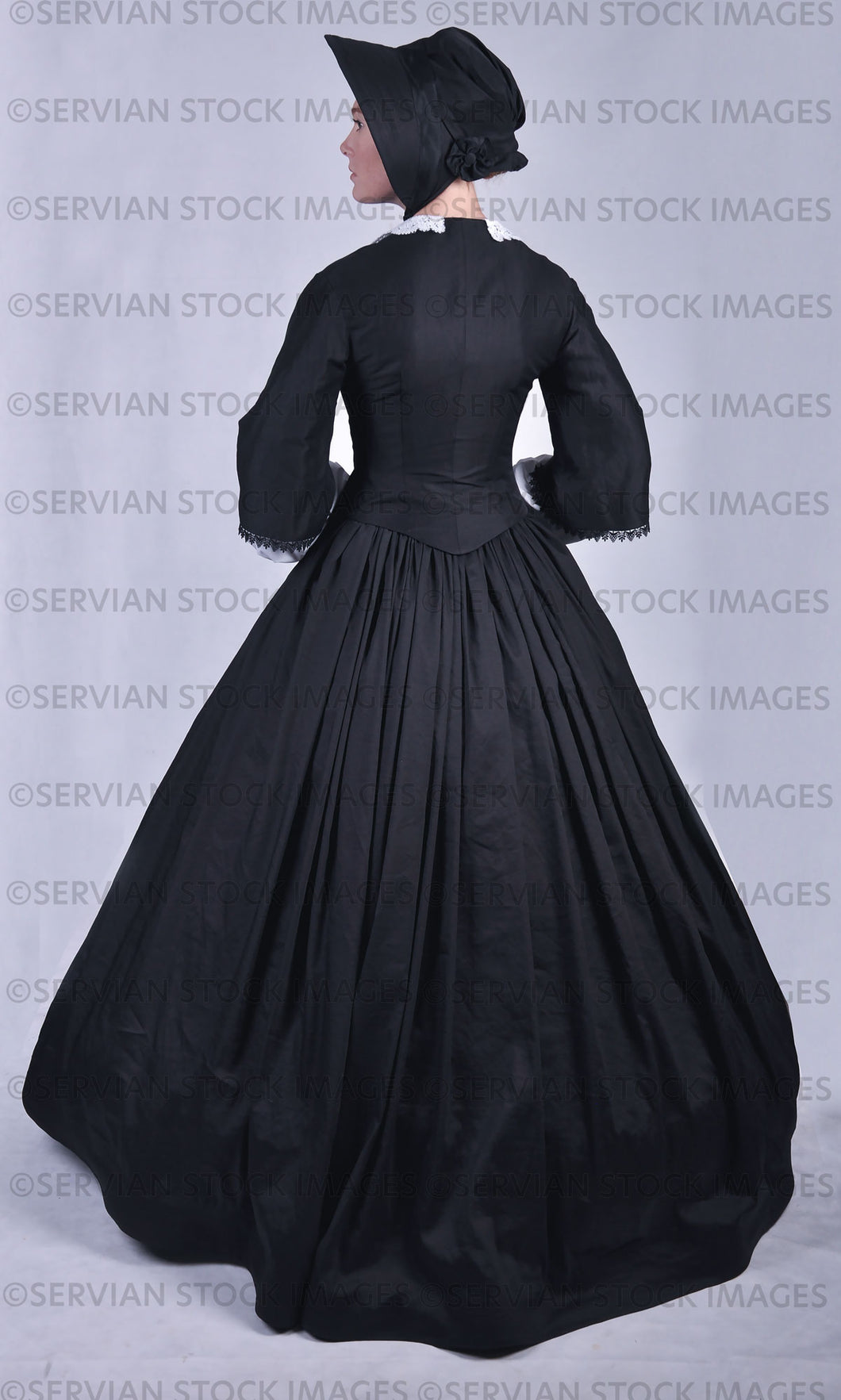 Victorian woman in a black ensemble with a lace collar  (Lauren 0795)