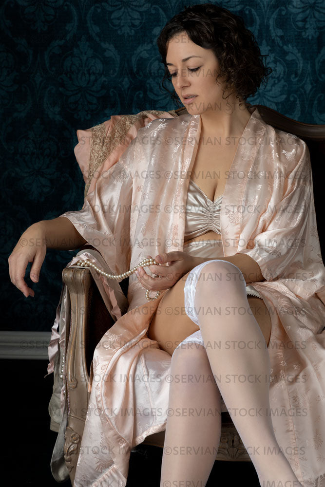 1920s woman wearing satin underwear and a robe (Emma 135)