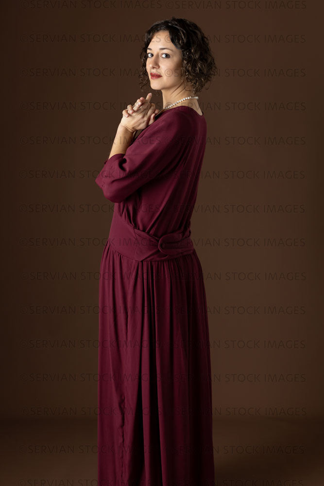 1920s woman wearing a dark red day dress (Emma 240)