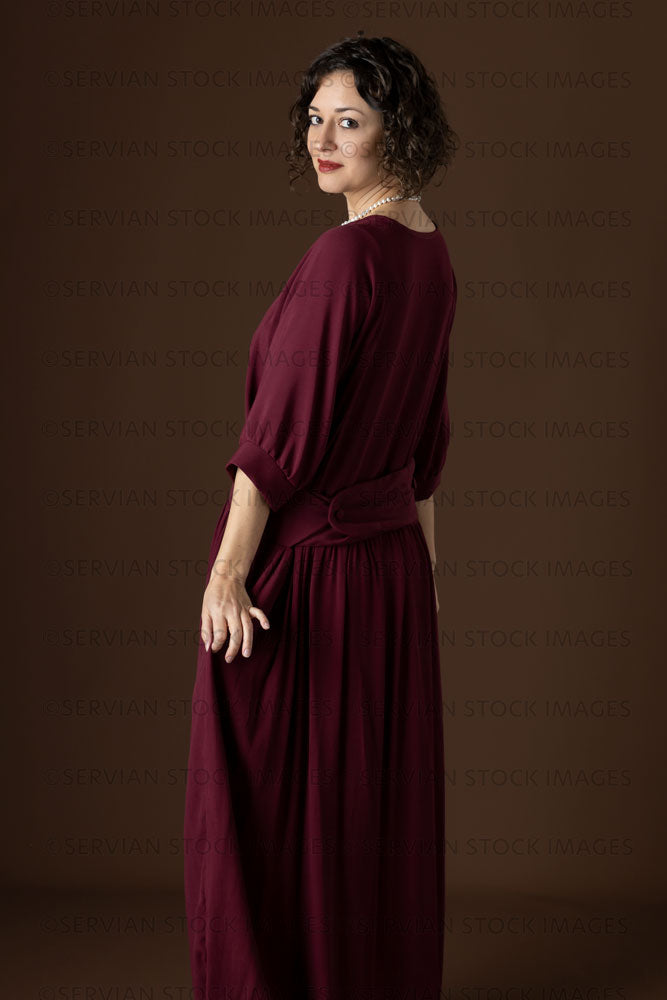 1920s woman wearing a dark red day dress (Emma 241)