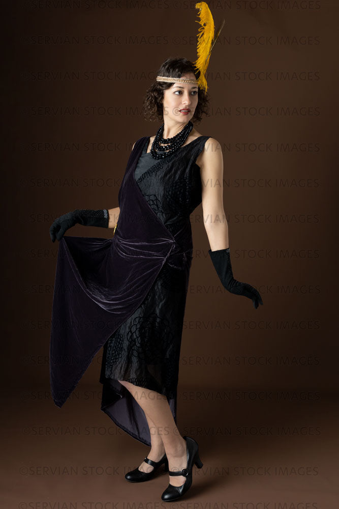 1920s woman wearing an evening dress with long black gloves (Emma 308)