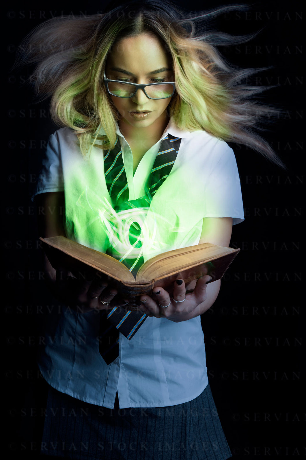 Schoolgirl reading a magic book (Jordarn 0357)