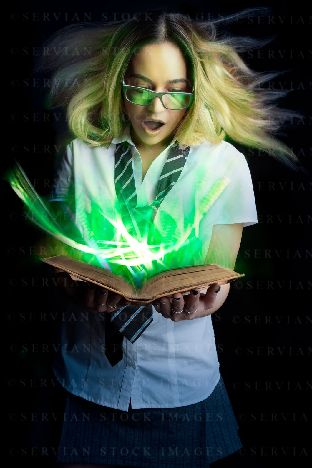 Schoolgirl reading a magic book (Jordarn 0360)