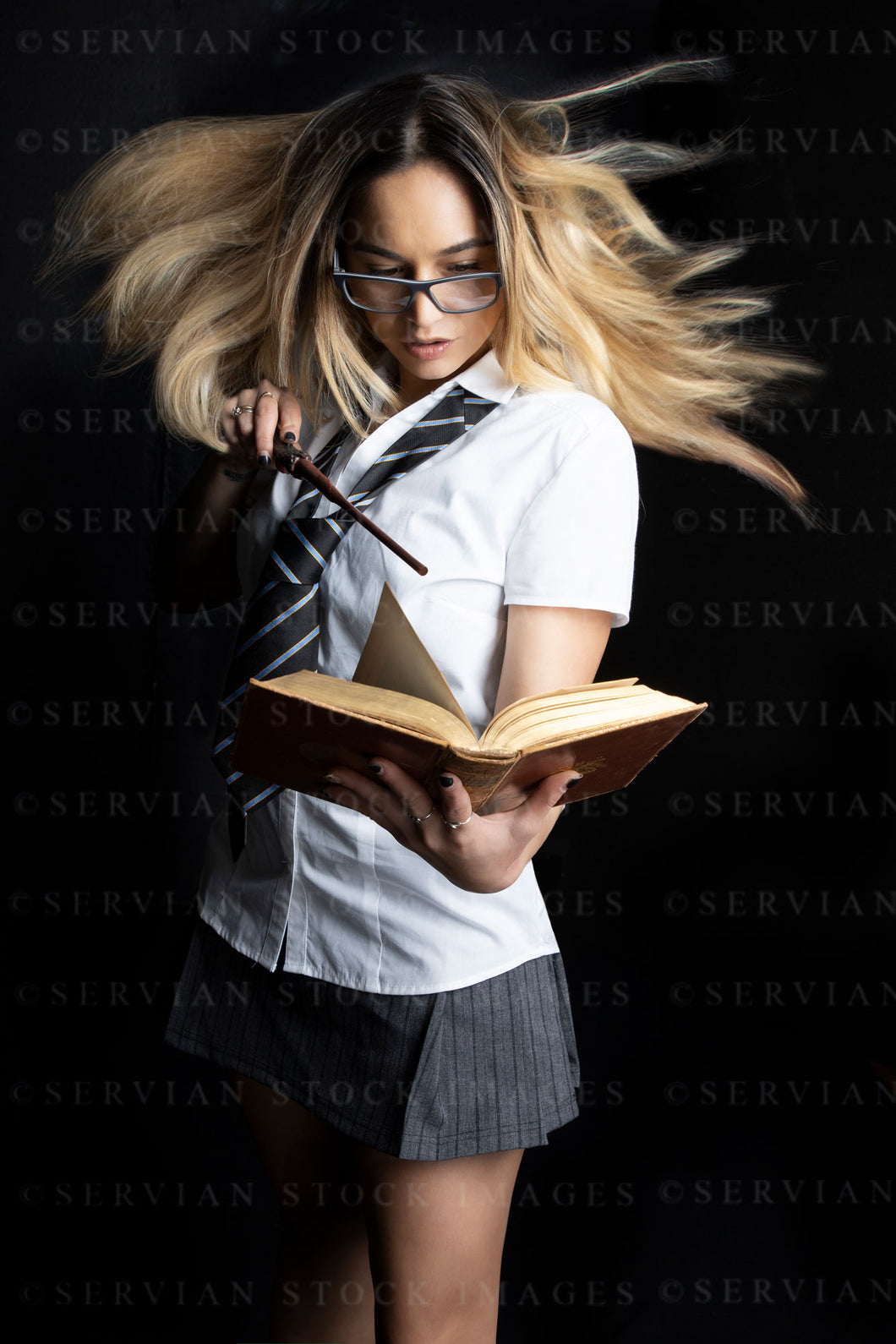 Schoolgirl doing magic-without effects (Jordarn 0364-1)