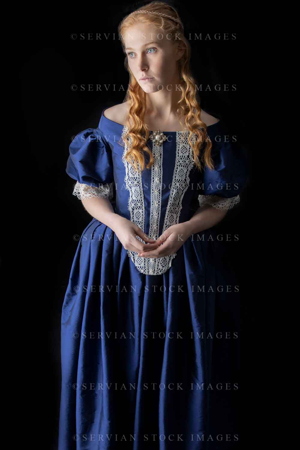 Renaissance woman in a blue silk dress against a black backdrop (Lauren 0490)