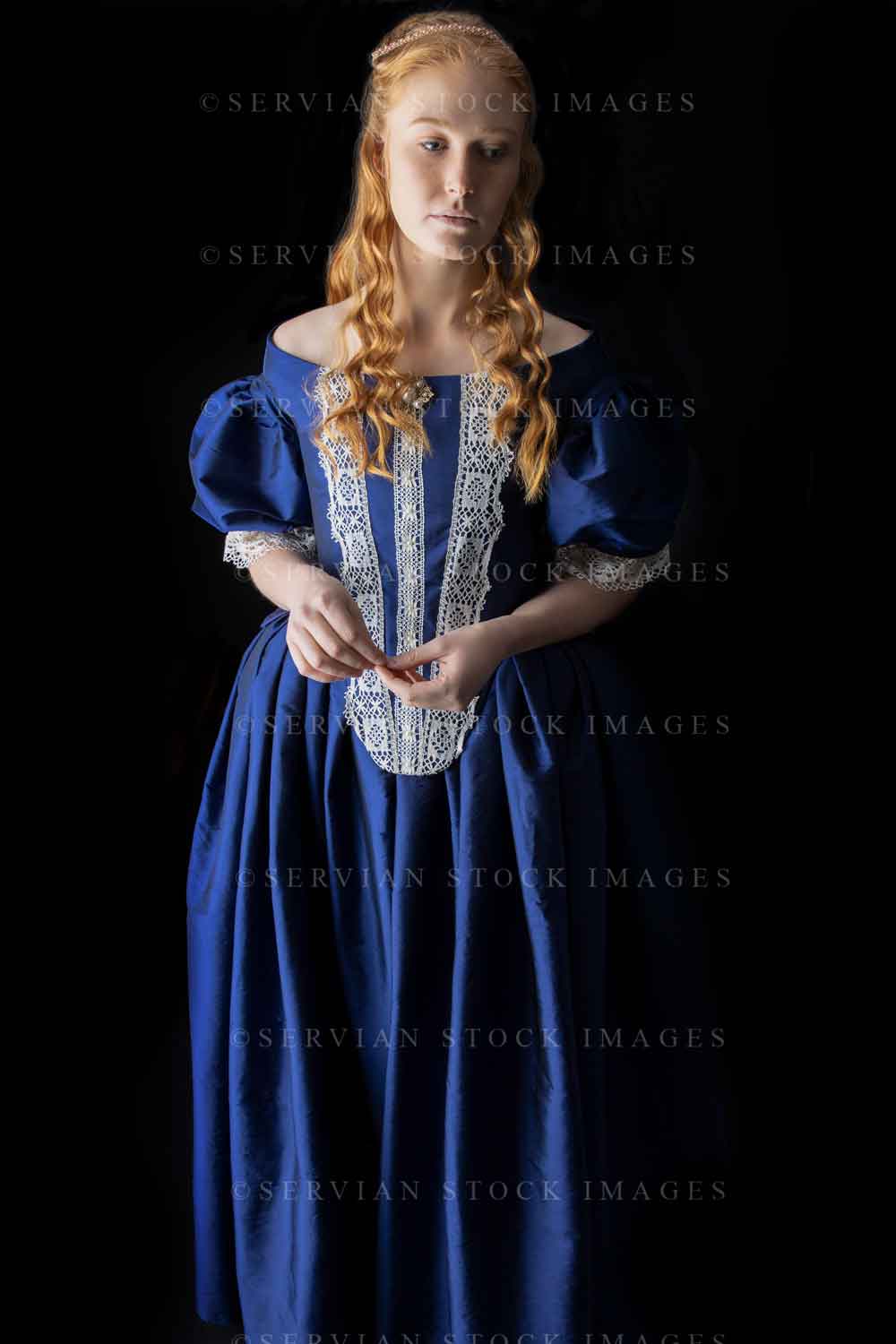 Renaissance woman in a blue silk dress against a black backdrop (Lauren 0491)