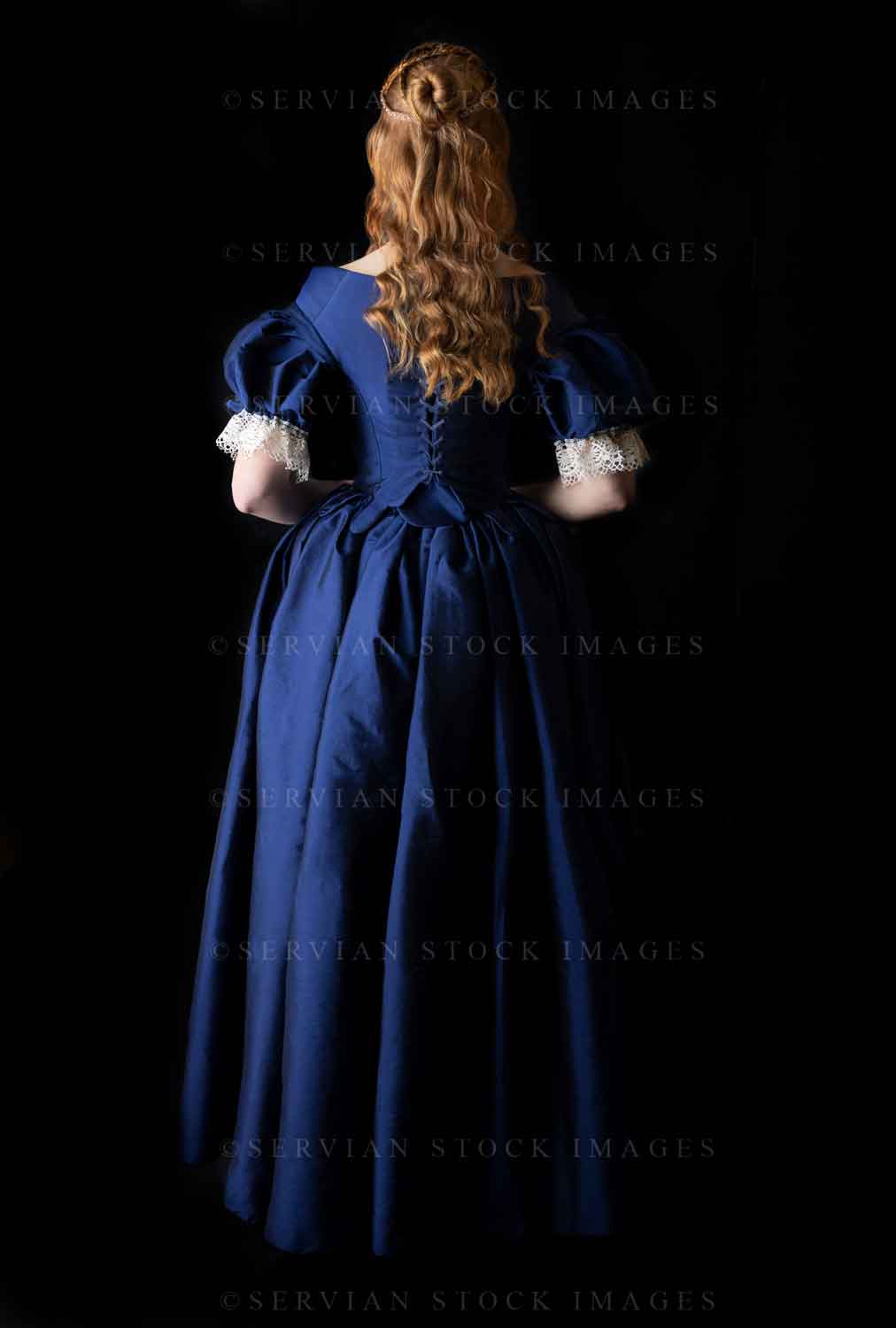 Renaissance woman in a blue silk dress against a black backdrop (Lauren 0633)