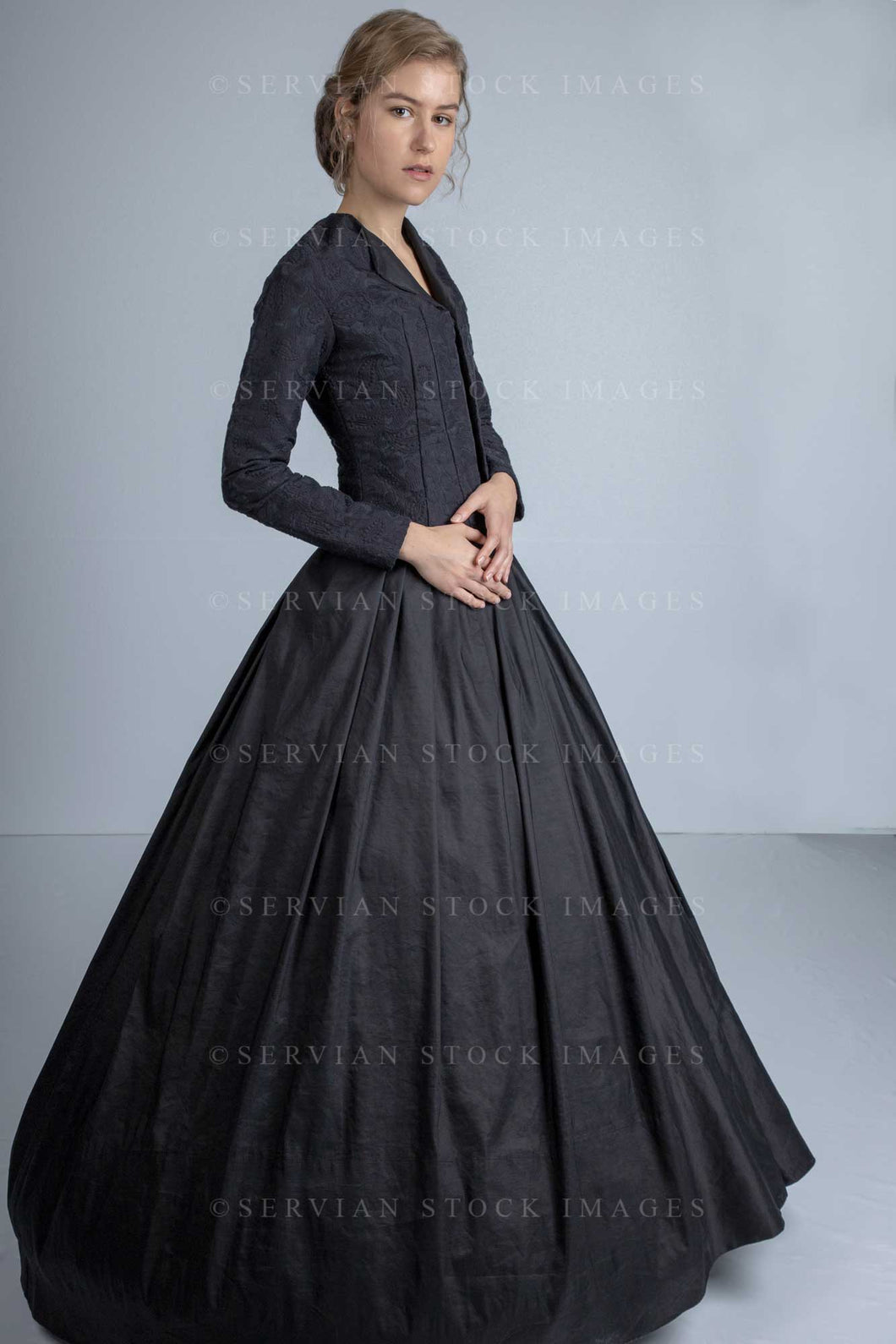 Victorian woman wearing a black bodice and skirt (Amalia 0703)