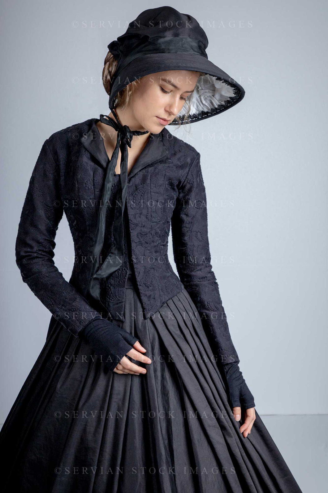 Victorian woman wearing a black bodice and skirt (Amalia 0714)