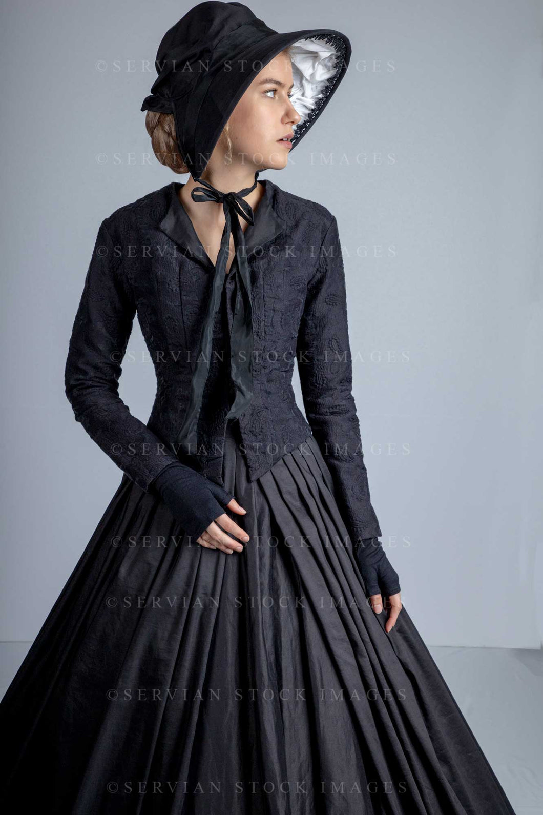 Victorian woman wearing a black bodice and skirt (Amalia 0716)
