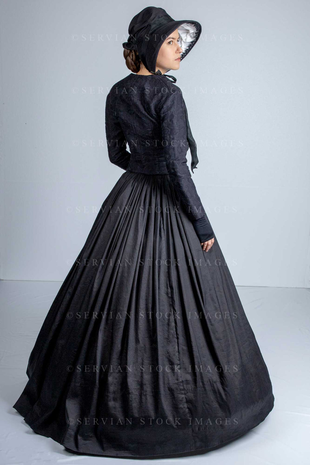 Victorian woman wearing a black bodice and skirt (Amalia 0727)