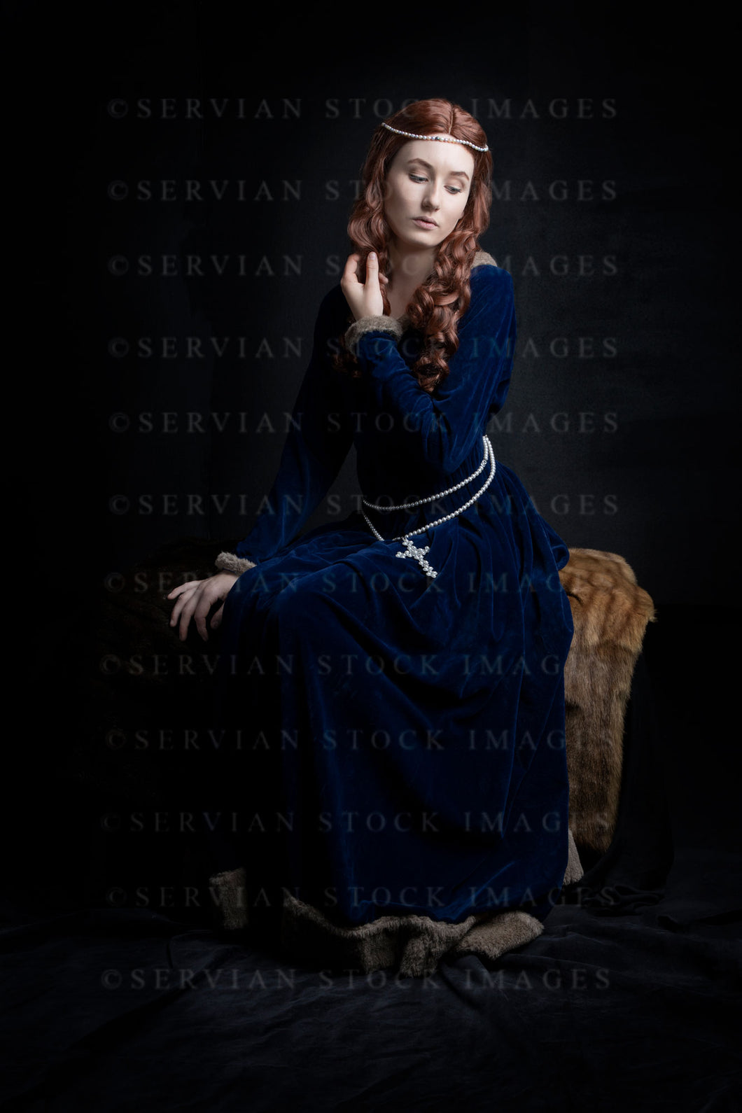 Medieval woman wearing a blue velvet dress (Olivia 1001)