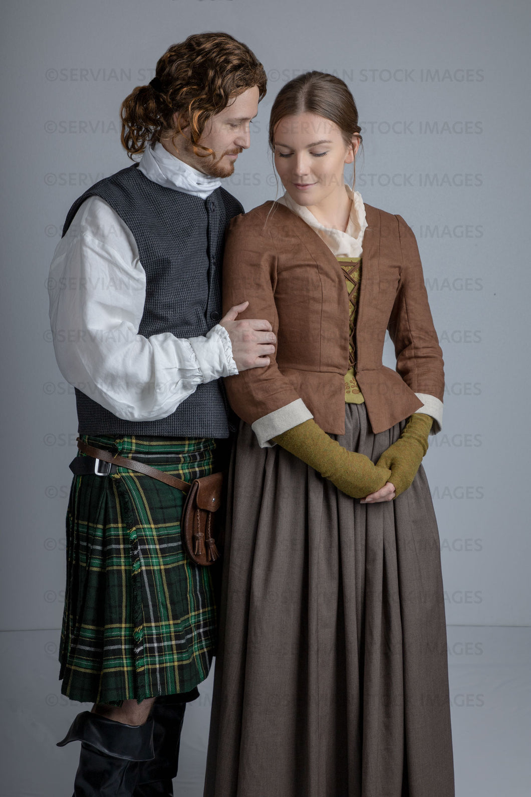 Georgian Scottish couple against a light grey backdrop (Tayla and Aaron 1120)
