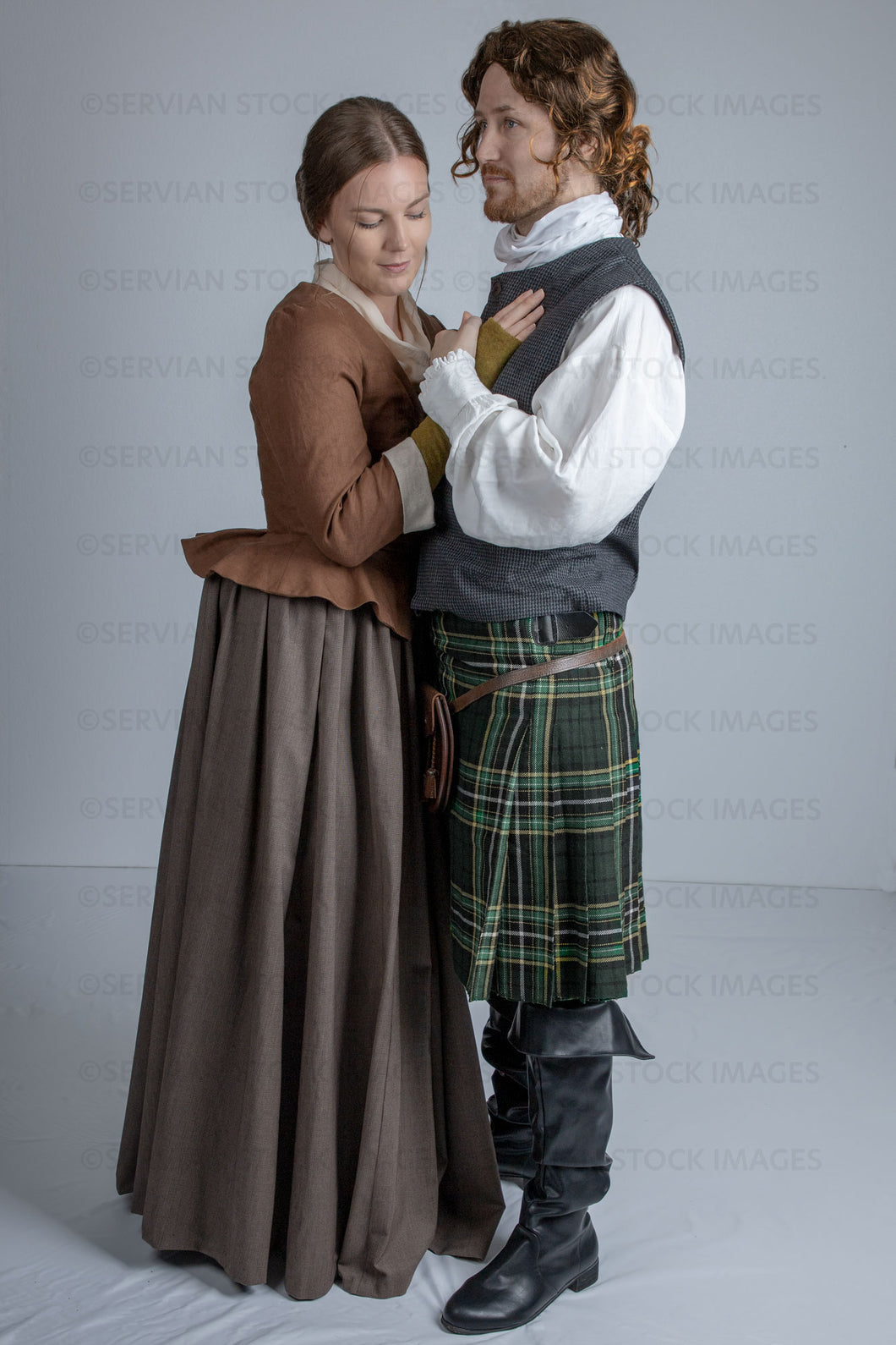 Georgian Scottish couple against a light grey backdrop (Tayla and Aaron 1127)