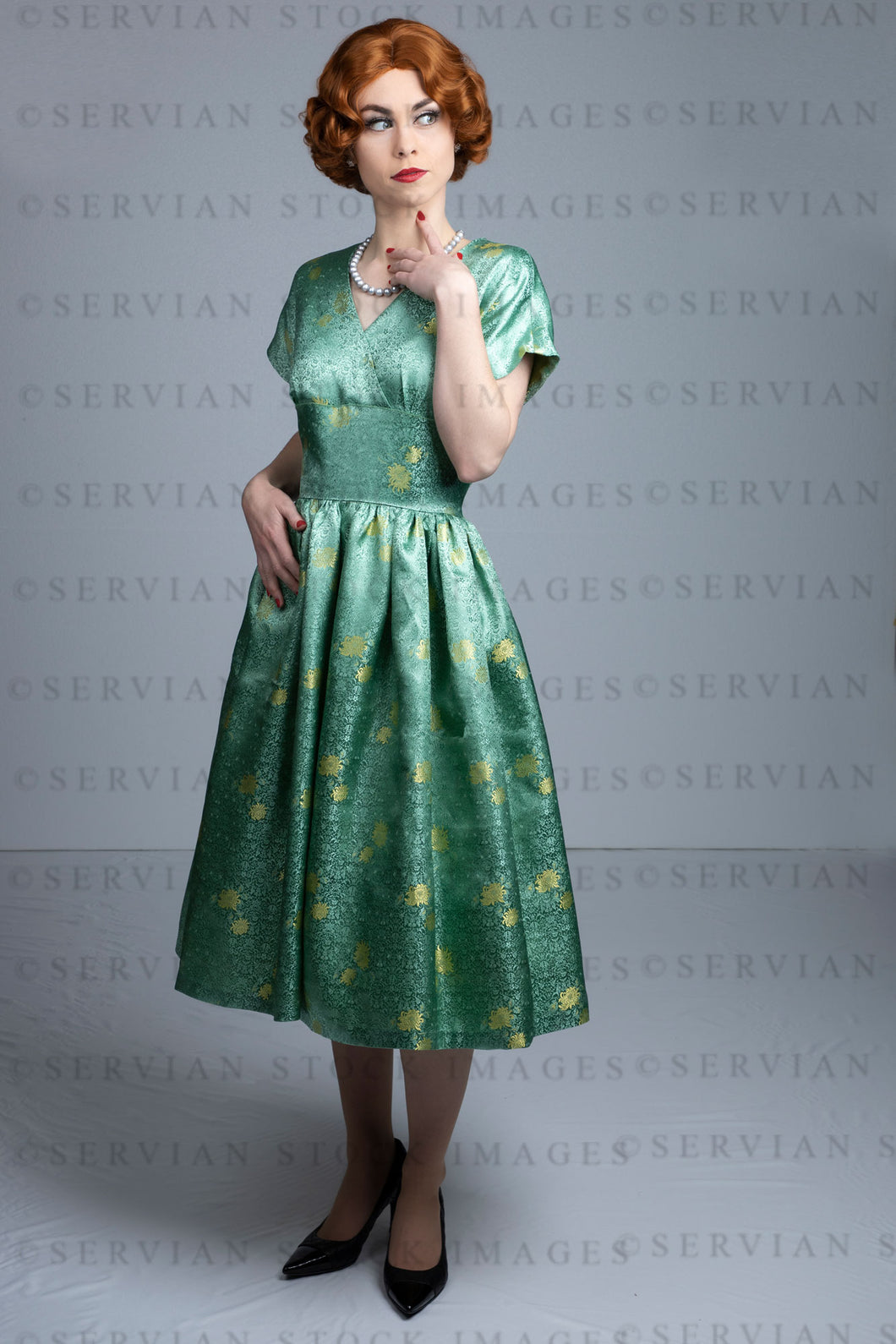 1950s woman in green brocade vintage dress (Lacey 2437)
