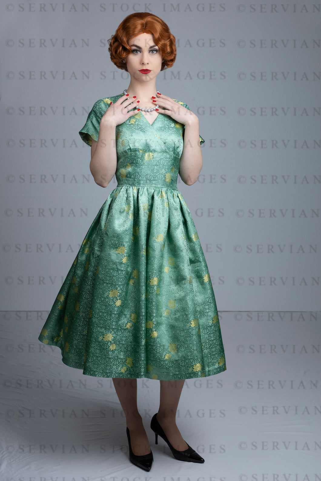 1950s woman in green brocade vintage dress (Lacey 2442)