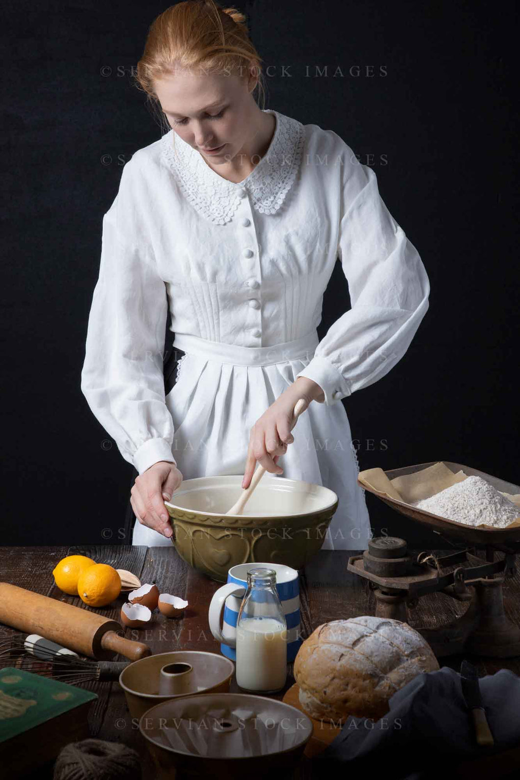 Victorian woman baking in her kitchen (Lauren 2706)