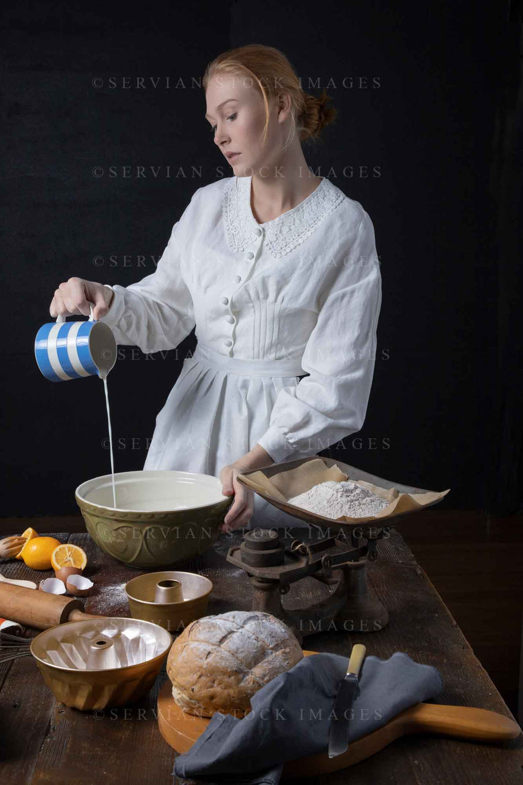 Victorian woman baking in her kitchen (Lauren 2783)