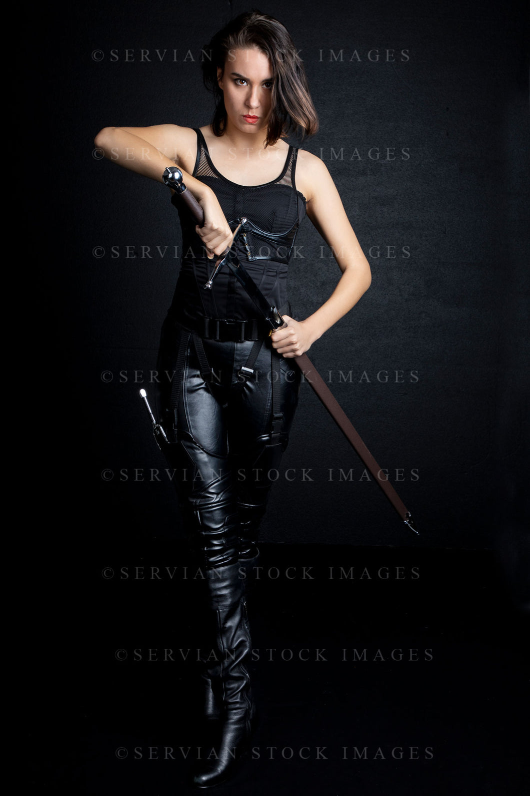 Urban fantasy woman with short dark, hair holding a sword (Sarah  9644)