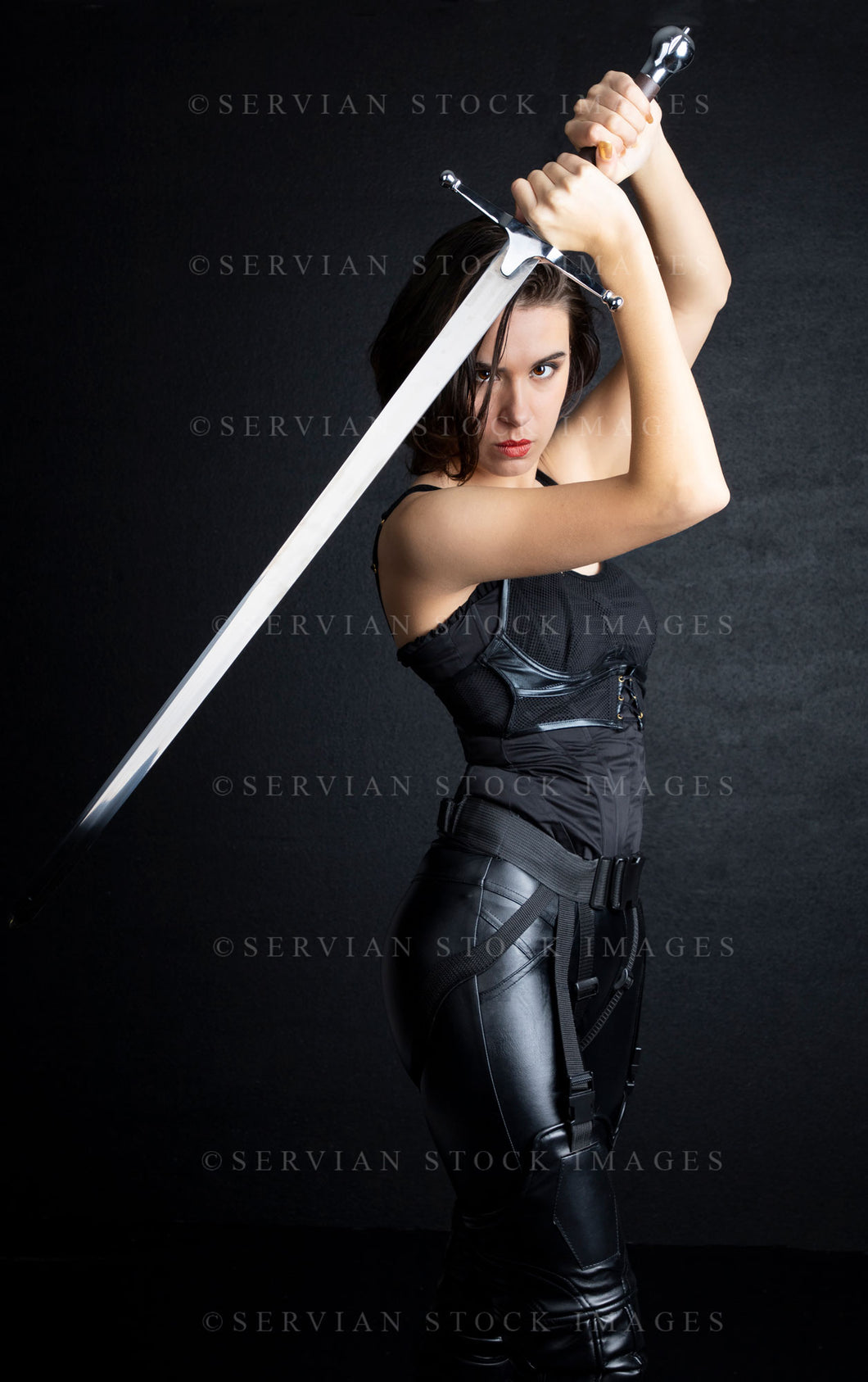Urban fantasy woman with short dark, hair holding a sword (Sarah 9686)
