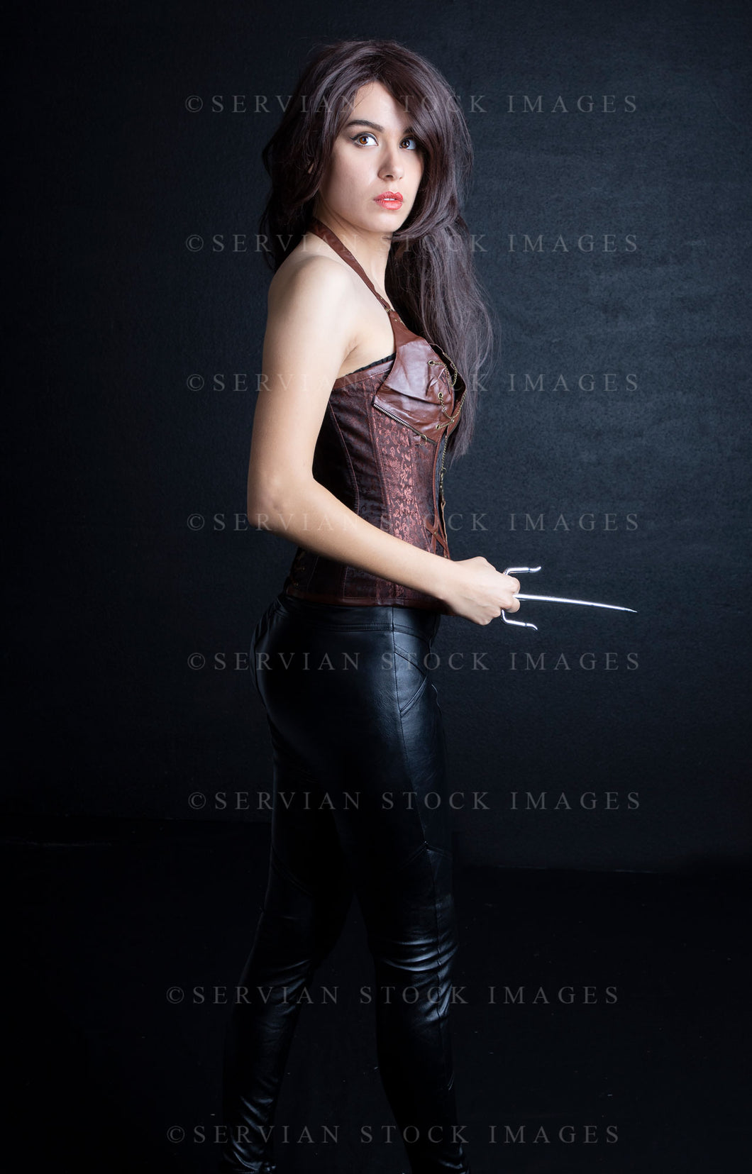 Urban fantasy woman with long brown hair and a brown corset (Sarah 9792)