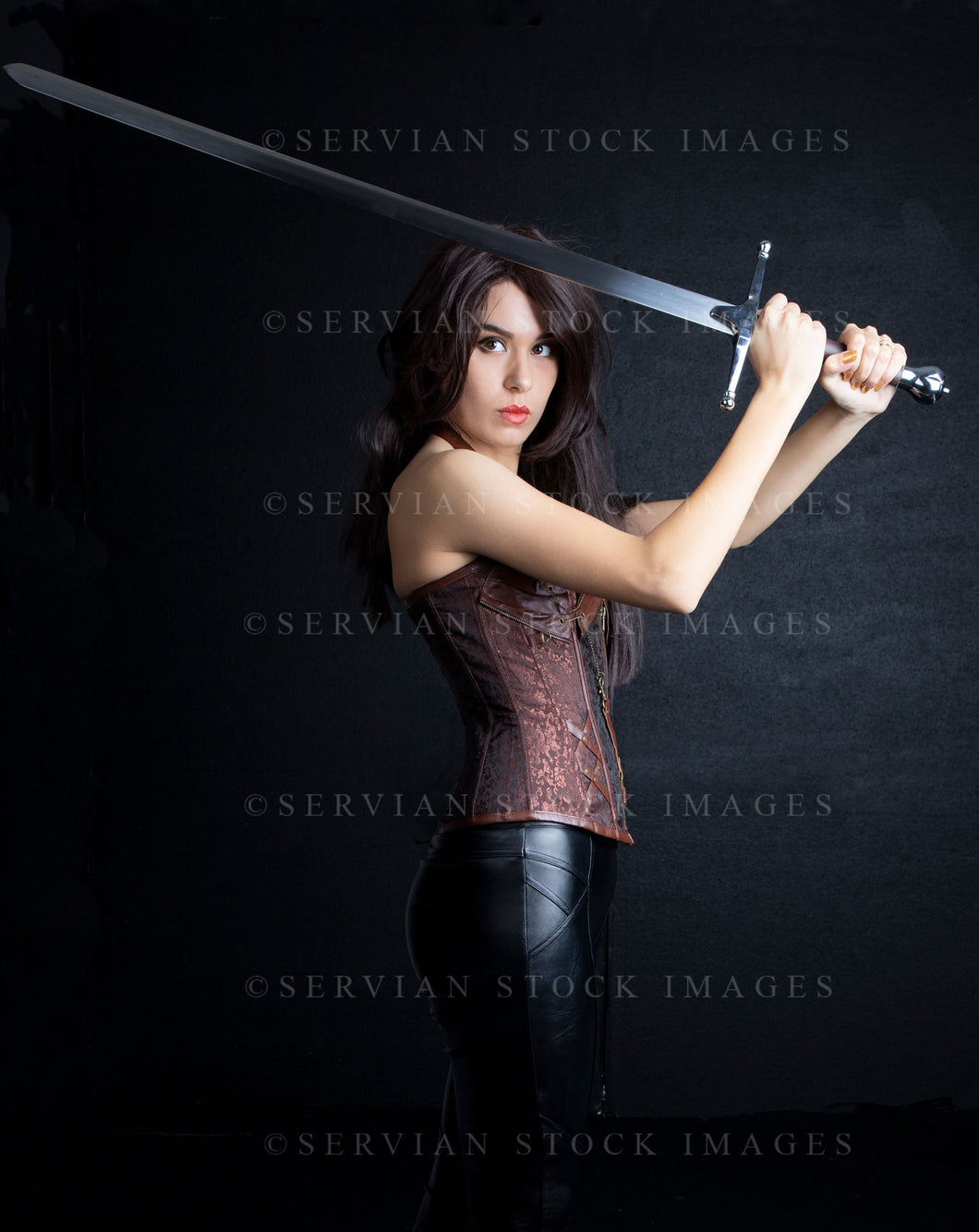 Urban fantasy woman with long brown hair and a brown corset and holding a sword (Sarah 9798)