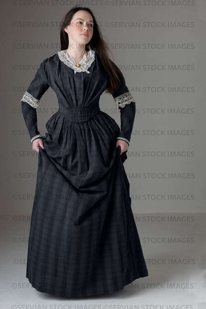 Young Victorian woman wearing a grey/blue cotton dress with antique lace trim (Kate 481)