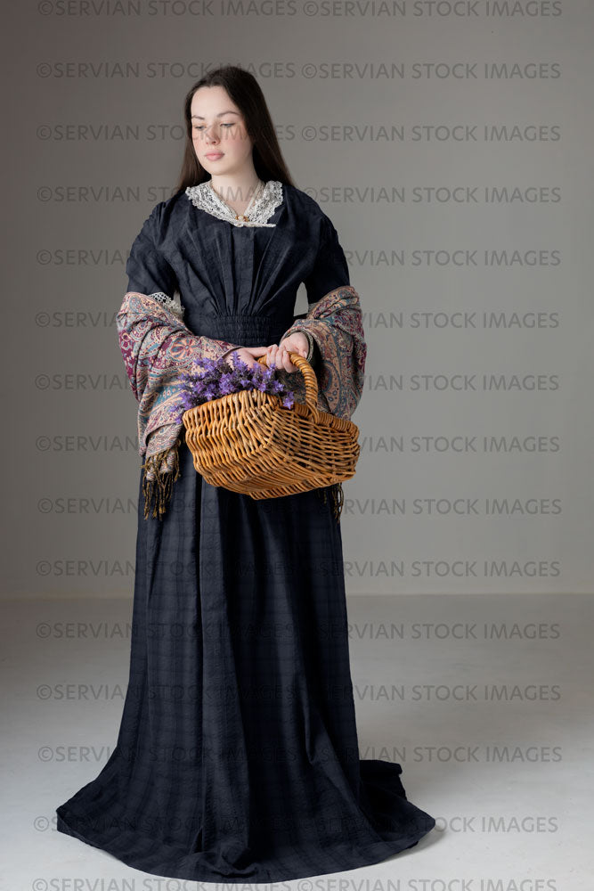 Young Victorian woman wearing a grey/blue cotton dress with antique lace trim (Kate 518)