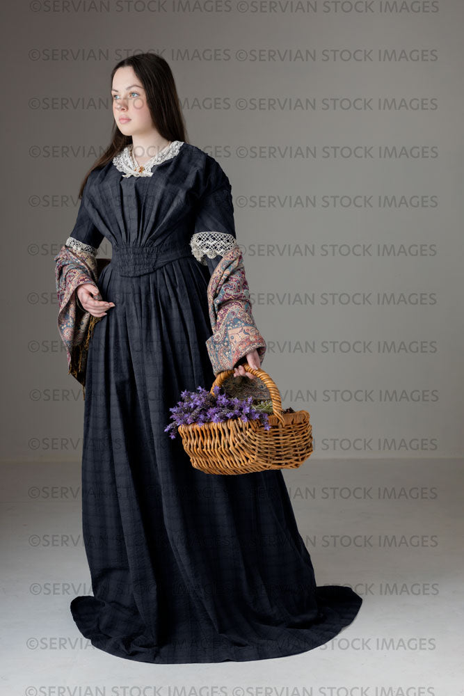 Young Victorian woman wearing a grey/blue cotton dress with antique lace trim (Kate 524)