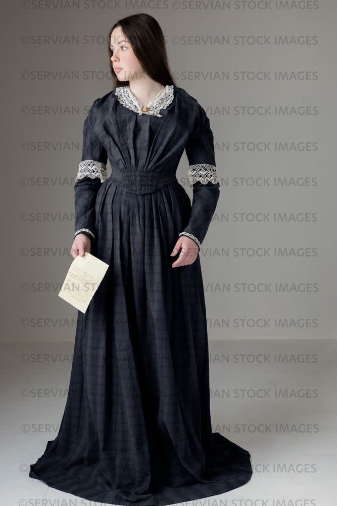Young Victorian woman wearing a grey/blue cotton dress with antique lace trim (Kate 532)