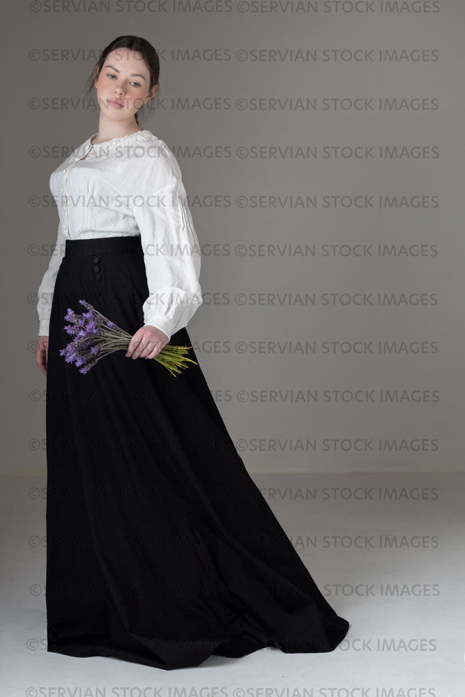 Young Victorian / Edwardian woman wearing a white linen blouse and black skirt (Kate 585)