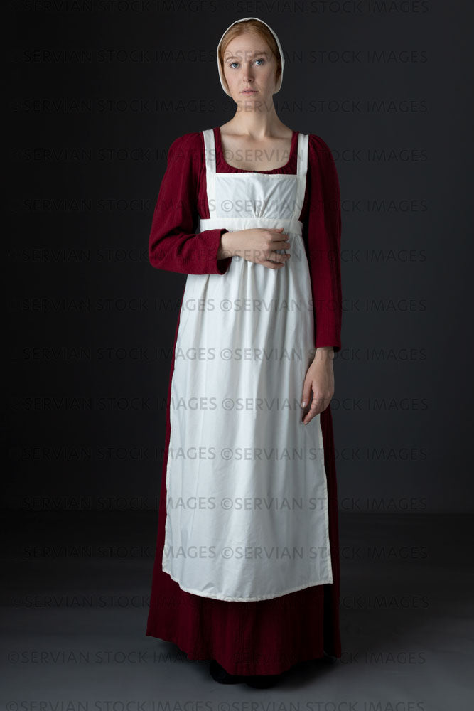 Regency maid or working class woman wearing a red dress, apron, and cap (Lauren 0615)