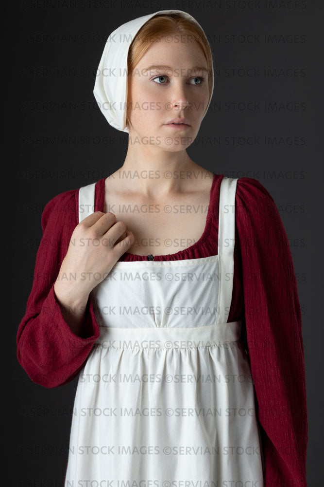 Regency maid or working class woman wearing a red dress, apron, and cap (Lauren 0633)