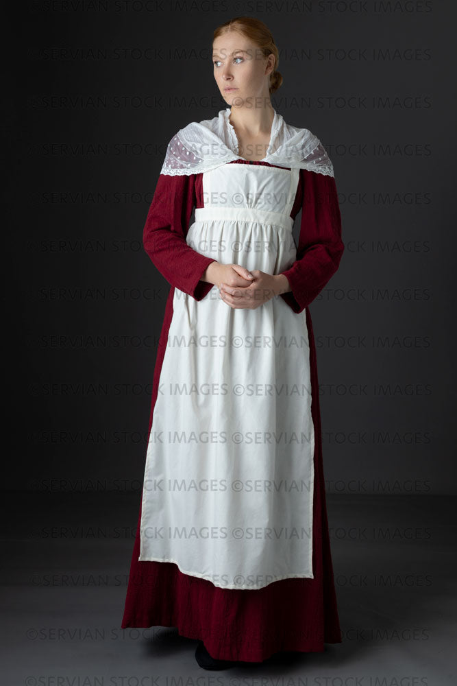 Regency maid or working class woman wearing a red dress, lace shawl and apron (Lauren 06601)