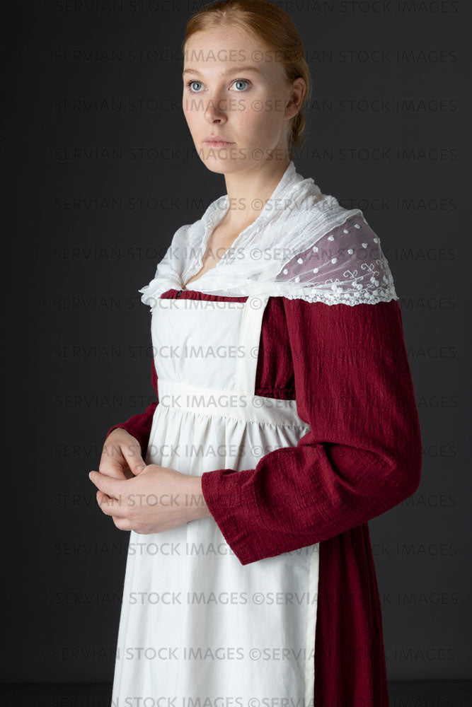 Regency maid or working class woman wearing a red dress, apron, and lace shawl (Lauren 06741)