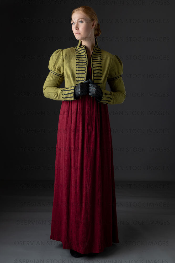 Regency woman wearing a red dress with a green linen spencer  (Lauren 0711)