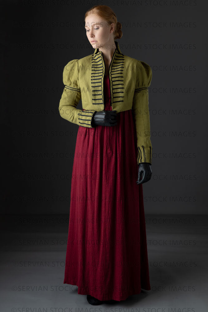 Regency woman wearing a red dress with a green linen spencer  (Lauren 0715)
