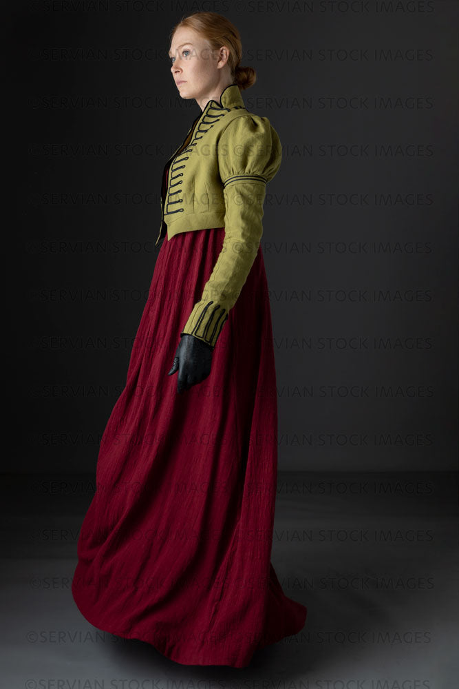 Regency woman wearing a red dress with a green linen spencer  (Lauren 0721)