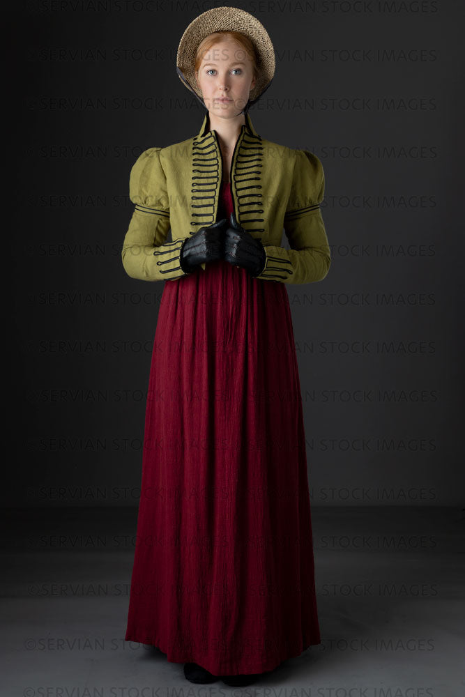 Regency woman wearing a red dress with a green linen spencer  (Lauren 0736)