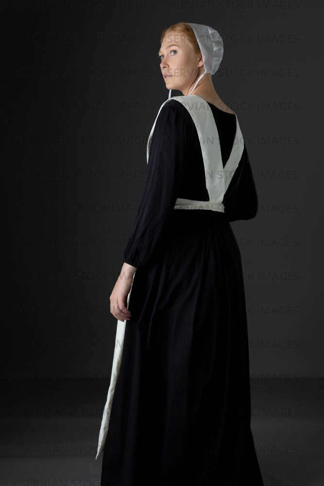 amish black dress woman wearing a with a white apron and cap (Lauren 0786) COLOR:Icy Topaz Black Leatherette Block Heels Sleeve Type:Long Sleeve Minimal shrinkage expected with